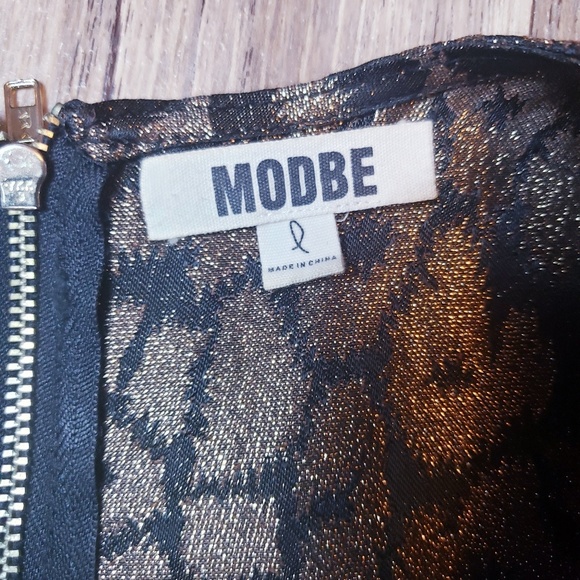 BEAUTIFUL MODBE CHEETAH PRINT PEPLUM TOP ( L) - Picture 4 of 5